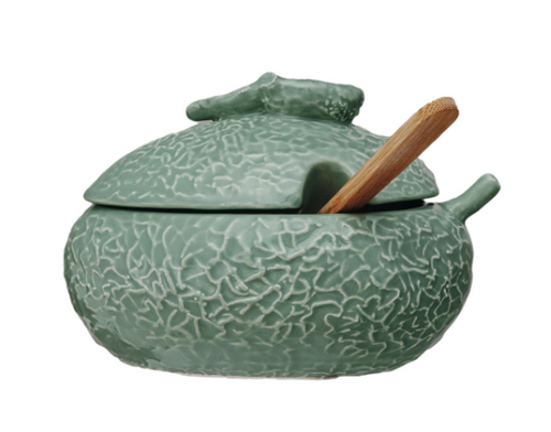 Green Fruit Dish with Spoon