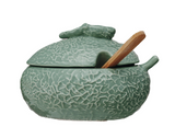 Green Fruit Dish with Spoon